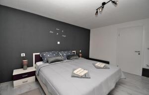 Postel nebo postele na pokoji v ubytování Apartman Fabris