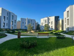 Κήπος έξω από το IVIS House - Cozy Seaside Apartment at "Šventosios Vartai" P-1