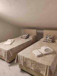 Ένα ή περισσότερα κρεβάτια σε δωμάτιο στο Casa Marco Aurelio al Mare