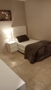 En eller flere senge i et værelse på Hotel Sol Sanlúcar