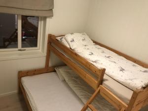 Säng eller sängar i ett rum på Voss Resort Bavallstunet