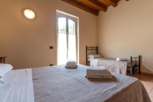 Agriturismo Corte Salandini客房内的一张或多张床位