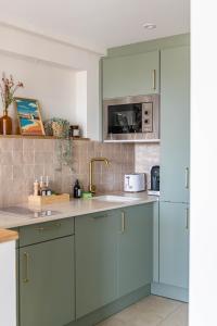 Eldhús eða eldhúskrókur á VUE 180°, superbe appartement cocooning !