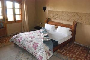 Hotel Taddart客房内的一张或多张床位