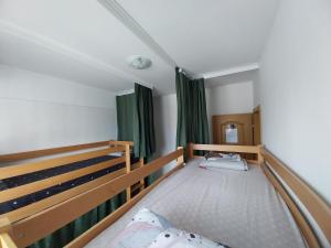 Postel nebo postele na pokoji v ubytování Railway Hostel
