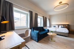 Postel nebo postele na pokoji v ubytování Hotel Zum Mohren
