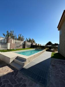 Πισίνα στο ή κοντά στο Oasis en la playa: piscina y relax