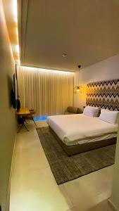 Una cama o camas en una habitación de Suite on the beach