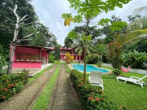 a villa with a swimming pool and a house at Casa Flamingo in San Felipe