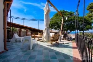 Balkón alebo terasa v ubytovaní VILLA ROSETTA ampi spazi esterni WIFI FREE