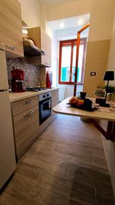 Η κουζίνα ή μικρή κουζίνα στο Casa Dany +8 φωτογραφίες