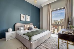 Postel nebo postele na pokoji v ubytování GuestReady - Residência de luxo no Dubai Creek