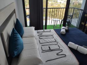 Posteľ alebo postele v izbe v ubytovaní Pinar Suites Habitaciones