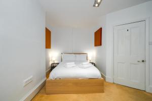 Säng eller sängar i ett rum på Comfortable stay in Brockley Conservation Area