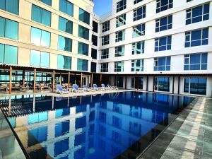 Bazén v ubytování Sur Grand Hotel nebo v jeho okolí