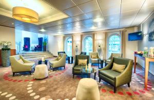 TV a/nebo společenská místnost v ubytování Leonardo Hotel Hamburg City Nord