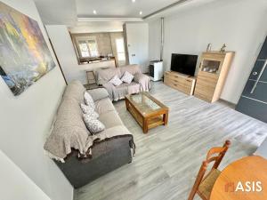 Μια τηλεόραση ή/και κέντρο ψυχαγωγίας στο Apartamento asis B