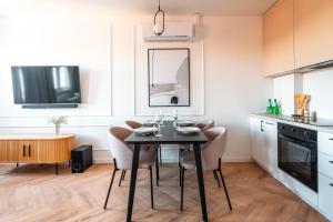 Kuchyň nebo kuchyňský kout v ubytování Apartamenty przy Wiśle + 4 fotografie