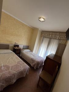 Postel nebo postele na pokoji v ubytování Ca L´Ángels