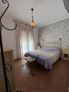 Postel nebo postele na pokoji v ubytování Ca L´Ángels