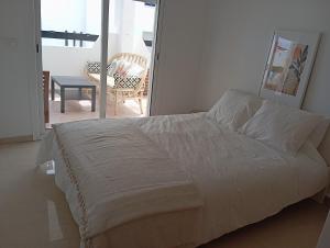 Postel nebo postele na pokoji v ubytování Alcudia Smir Apartment