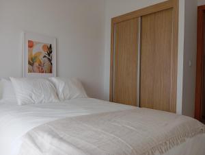 Postel nebo postele na pokoji v ubytování Alcudia Smir Apartment