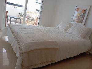 Postel nebo postele na pokoji v ubytování Alcudia Smir Apartment
