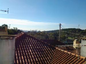 a view of a tile roof of a building at Typical small house near Lisbon in Oeiras