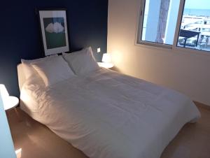 Postel nebo postele na pokoji v ubytování Alcudia Smir Apartment