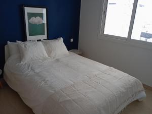 Postel nebo postele na pokoji v ubytování Alcudia Smir Apartment
