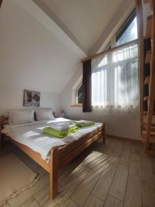 Postel nebo postele na pokoji v ubytování Apartmani Milutinovic