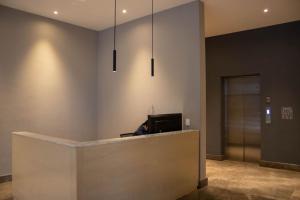 Ο χώρος του λόμπι ή της ρεσεψιόν στο Beautiful apartment, BBQ, A.C, 5 min Arena, Gym