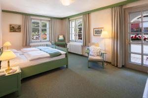 Posteľ alebo postele v izbe v ubytovaní Hotel Tre Cime Sesto - Sexten