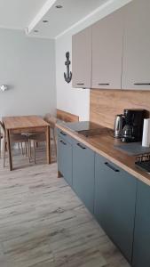 Η κουζίνα ή μικρή κουζίνα στο Aurora Apartament Gardenia