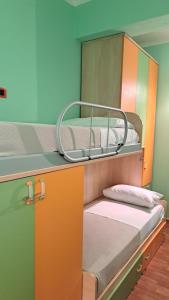 a bunk bed with two bunk beds in a room at La Foggia seaside paradise in Siculiana