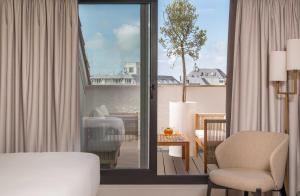 Posezení v ubytování Hôtel Arcanse by Inwood Hotels
