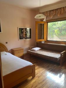 Ένα ή περισσότερα κρεβάτια σε δωμάτιο στο Exohi apartments