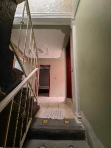 a staircase in a house with a stair case at Casa Doña Ade in Xalapa