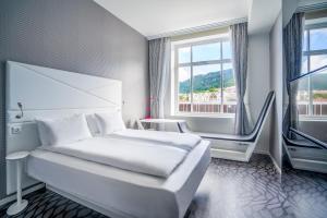 Postel nebo postele na pokoji v ubytování Magic Hotel & Apartments Kløverhuset