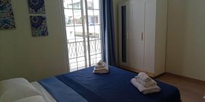 Un pat sau paturi într-o cameră la Samar 2