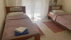 Posteľ alebo postele v izbe v ubytovaní Anna-Apartment