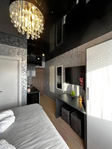 Postel nebo postele na pokoji v ubytování Stella Apartman Čačak