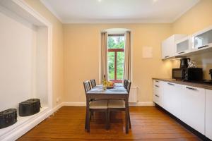 Køkken eller tekøkken på Alte Stadtvilla am Weinberg 3