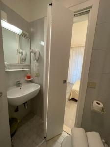 Koupelna v ubytování Hotel & Aparthotel Carinthia S + 37 fotografií