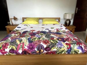 Letto o letti in una camera di Le jardin des B-joux