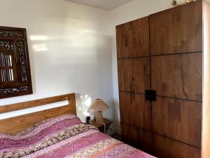 Letto o letti in una camera di Le jardin des B-joux