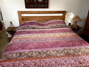 Letto o letti in una camera di Le jardin des B-joux