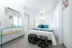 Giường trong phòng chung tại Casa Yus