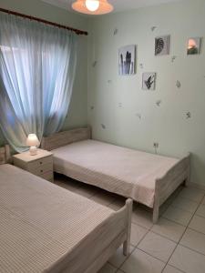 Postel nebo postele na pokoji v ubytování ELORA apartment