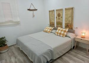 Postel nebo postele na pokoji v ubytování Nuevo apartamento junto al mar + 13 fotografií